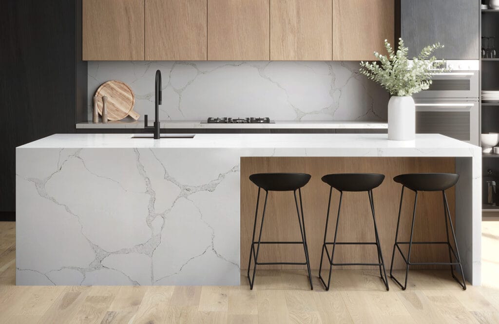 Modern kitchen island from Stone Design Concepts Gallery with sleek marble veining